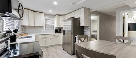 Fridge, oven, dishwasher, coffee/tea maker