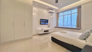 Apartemen Deluks, 3 kamar tidur, balkon | Setrika/meja setrika, Wi-Fi gratis, dan seprai linen