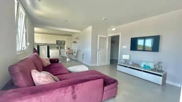 Family Apartment | Living area | 32-inch LCD TV with cable channels