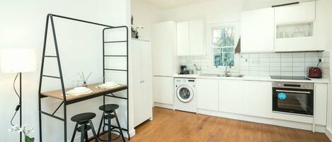 Apartment, Multiple Beds | Private kitchen