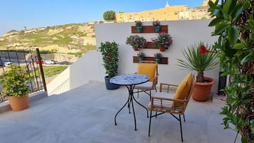 Quarto casal superior | Terraço/pátio