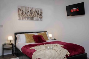 1 habitación, tabla de planchar con plancha, wifi gratis y ropa de cama 