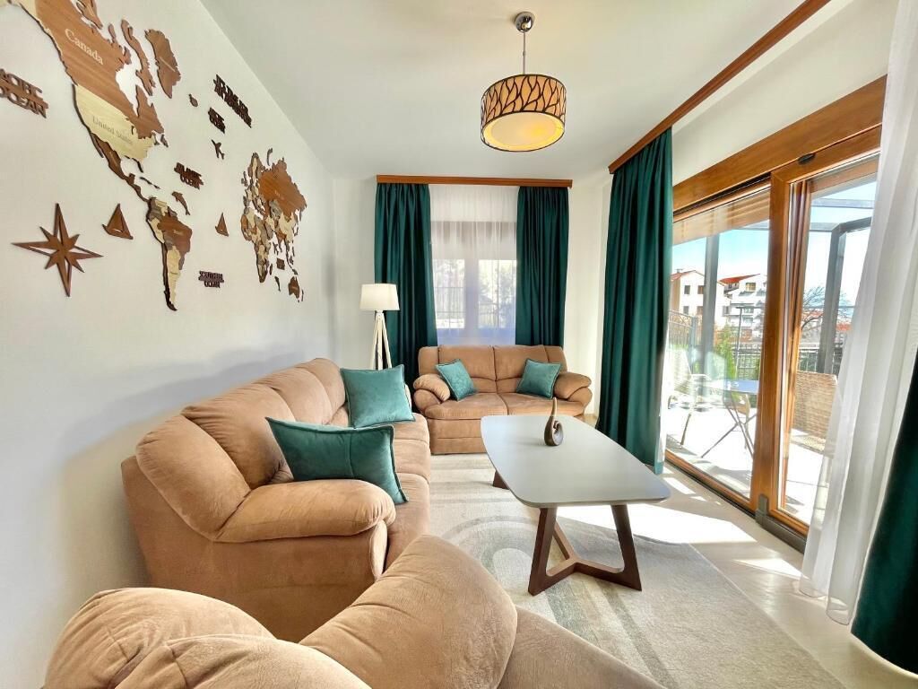 Deluxe Villa | Living area | 32-inch LCD TV with cable channels