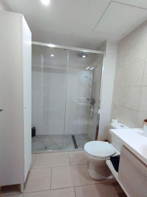 Hair dryer, towels, soap, shampoo