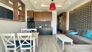 Leilighet – comfort, byutsikt | Oppholdsområde