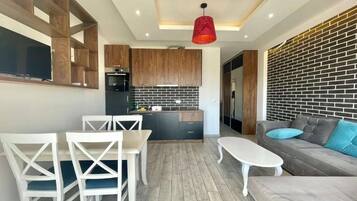 Comfort Apartment | Living area | LCD TV