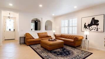 TV, fireplace, books, offices