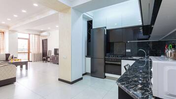 Comfort Apartment | Living area | Flat-screen TV