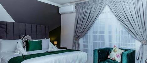 Habitación ejecutiva | 1 habitación, decoración personalizada, muebles diferentes y escritorio