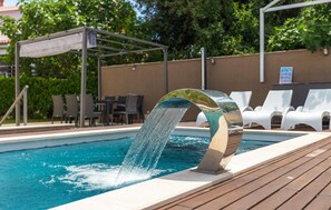 Et oppvarmet basseng