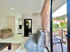 Estúdio clássico | Roupas de cama premium, escrivaninha, quartos à prova de som