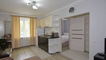 Economy Apartment | Living area | TV