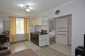 Economy-Apartment | Wohnbereich | Fernseher
