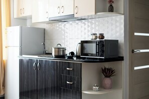 Økonomileilighet | Eget kjøkken | Kjøleskap, mikrobølgeovn, kokeplater og vannkoker