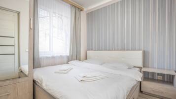 Economy Apartment | 1 bedroom, premium bedding, laptop workspace, blackout drapes