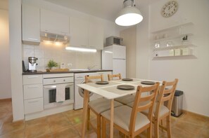 Fridge, microwave, oven, stovetop - Calma Suites modern 1BR apartment with terrace and views (Agulo)