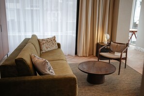 Superior Suite | Living area | 32-inch Smart TV with digital channels, Netflix, streaming services - By Friso (The Hague)