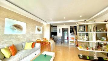 Comfort Apartment | Living area | 32-inch LCD TV with cable channels