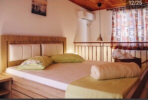 1 غرفة نوم ومكواة/لوح كي وواي فاي وملاءات أسرّة