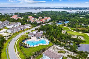 An aerial view of a residential area with a swimming pool, houses, and a golf course. - Beautiful house at Lost Key Resort Perdido Key (Perdido Key)