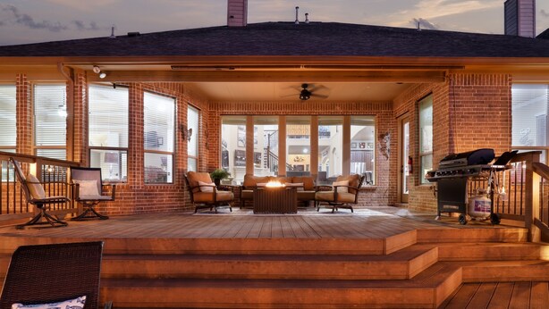 A covered patio with outdoor seating, a grill, and a fire pit. - The Views are for Miles! (San Antonio)