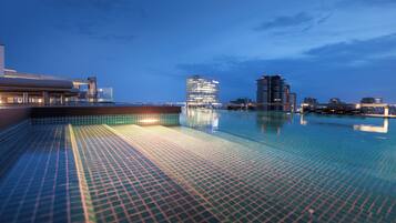 Outdoor pool, open 10:00 AM to 6:00 PM, pool umbrellas, sun loungers