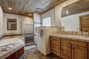 Premier House | Bathroom | Hair dryer, towels, soap, shampoo