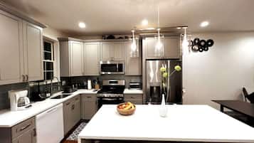 Fridge, coffee/tea maker, cookware/dishes/utensils