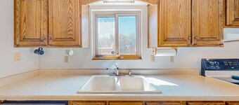 Large home with western-theme, wood-burning fireplace- dog-friendly