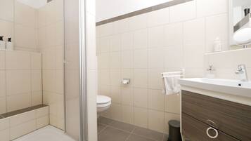 Hair dryer, towels, soap, shampoo