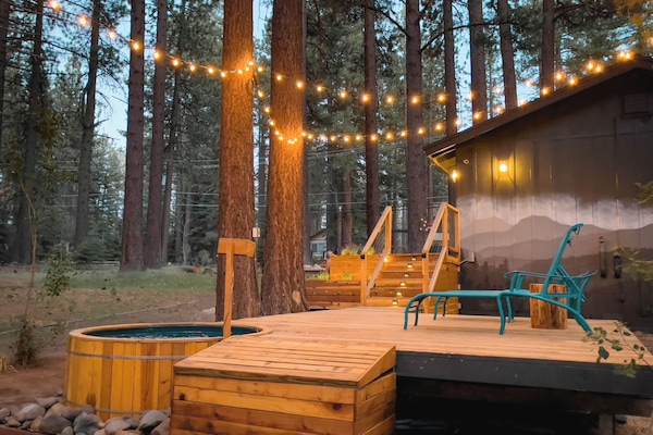 Plunge into the hot tub and relax as you soak in the views