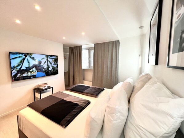 2 habitaciones, tabla de planchar con plancha, wifi y ropa de cama