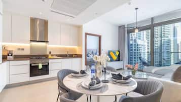 Luxury Apartment | Private kitchen | Fridge, microwave, oven, stovetop