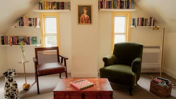 Romantic Suite, 1 King Bed with Sofa bed | Living area | 55-inch Smart TV with digital channels, streaming services