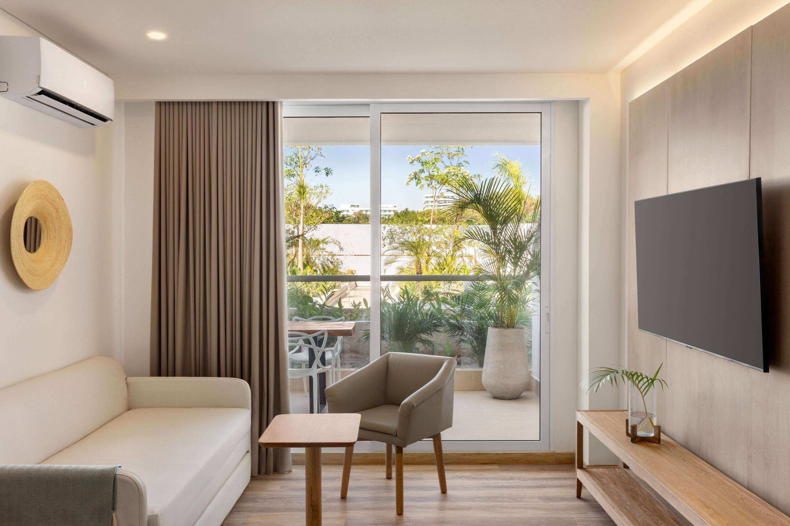 apartment, multiple beds (day bed) | living area | 50-inch smart tv with cable channels