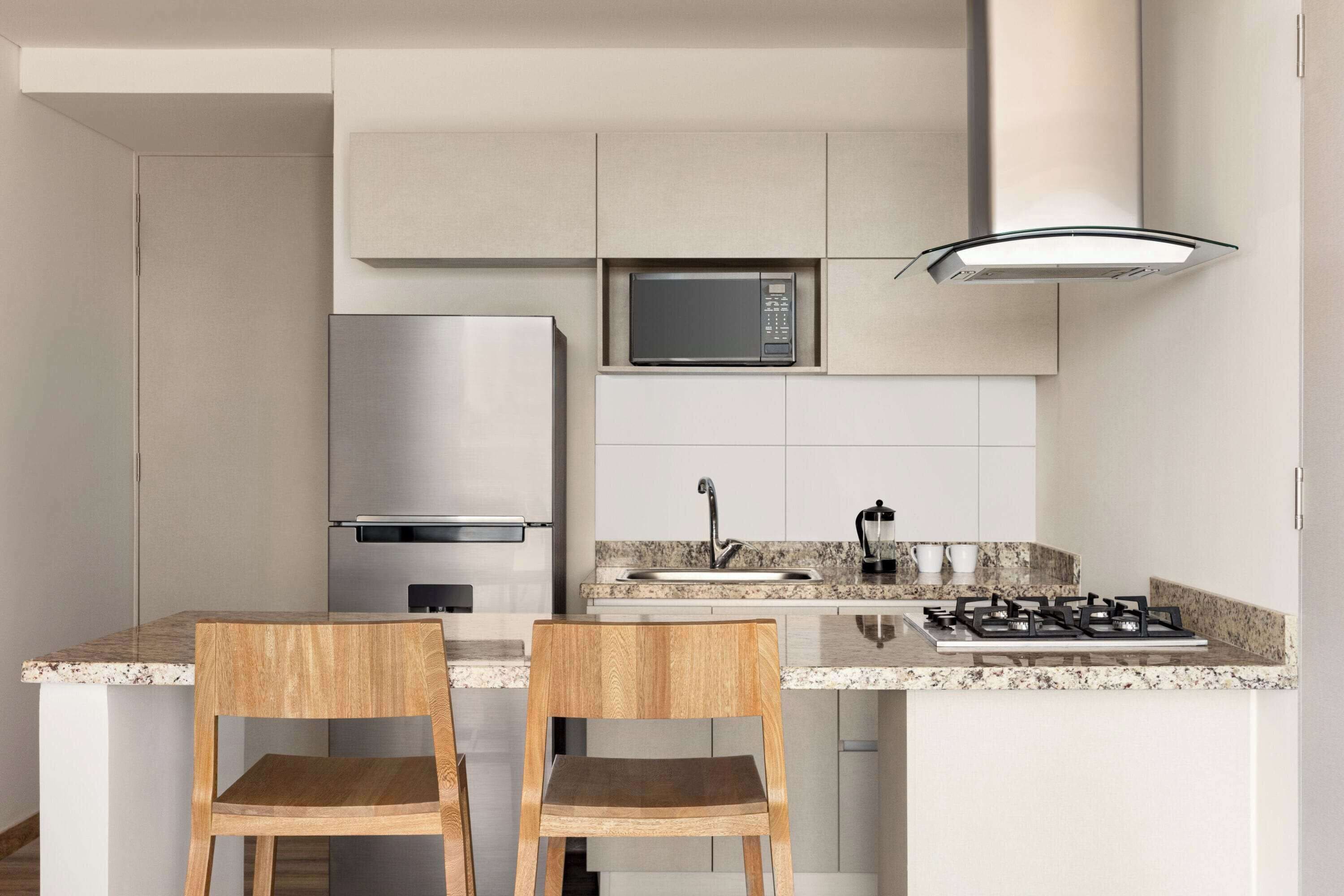 full-sized fridge, microwave, oven, dishwasher