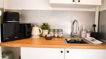 Fridge, microwave, electric kettle, toaster