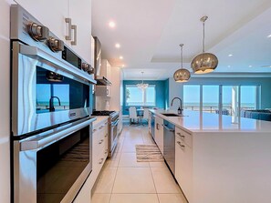 Fridge, microwave, oven, stovetop - Beach One: Style Meets the Shore w/ Pool and Spa (Treasure Island)