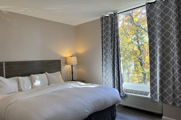 Minibar, desk, laptop workspace, iron/ironing board