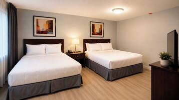 Economy Room | Minibar, desk, laptop workspace, iron/ironing board