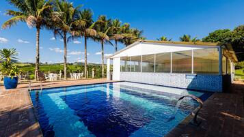 Indoor pool, outdoor pool, open 9:00 AM to 9:00 PM, pool umbrellas