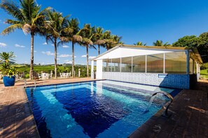 Indoor pool, outdoor pool, open 9:00 AM to 9:00 PM, pool umbrellas