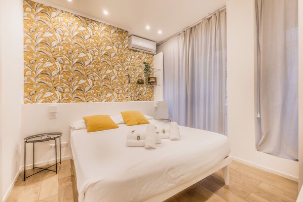 1 غرفة نوم ومكواة/لوح كي وواي فاي وملاءات أسرّة