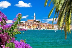 Stunning coastal town with a historic church and picturesque harbor.