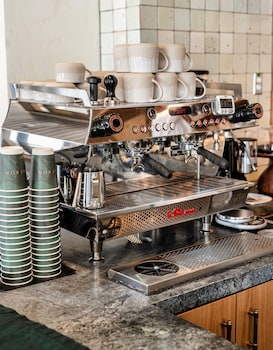 Enjoy expertly crafted coffee in a professional setting. at Hotel Heron Old Town Alexandria