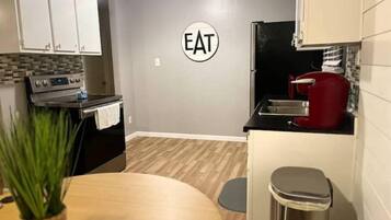 Fridge, microwave, oven, cookware/dishes/utensils