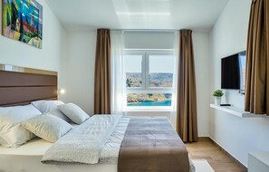 2 slaapkamers, een strijkplank/strijkijzer, reisbedje, gratis wifi