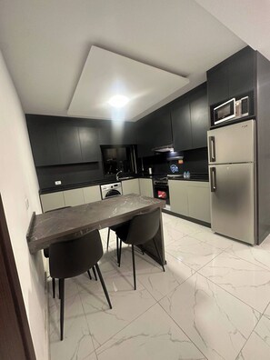 Apartment, 2 Bedrooms, Accessible, Smoking | Private kitchen - JRE Cozy Rooftop Near Al Services 23 (Amman)