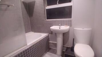 Hair dryer, towels, soap, shampoo