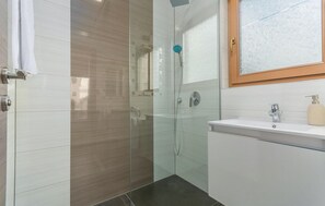 Regadera y secadora de cabello